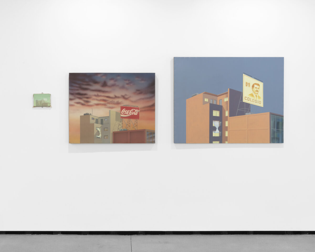 Three pastel canvases increasing in size from left to right. Each one depicts a city building.