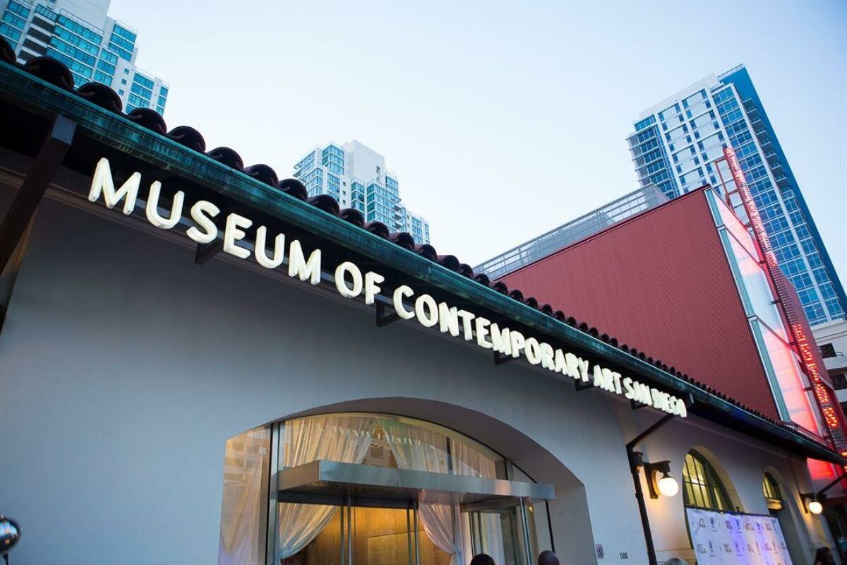 Neon sign that reads Museum of Contemporary Art of San Diego. Downtown location.
