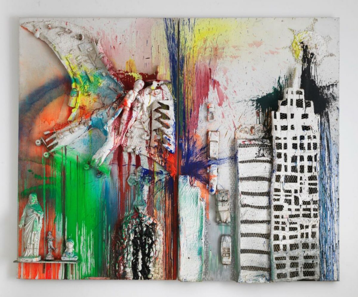 Splattered, saturated paint drips over a mock up of New York's cityscape by Niki de Saint Phalle