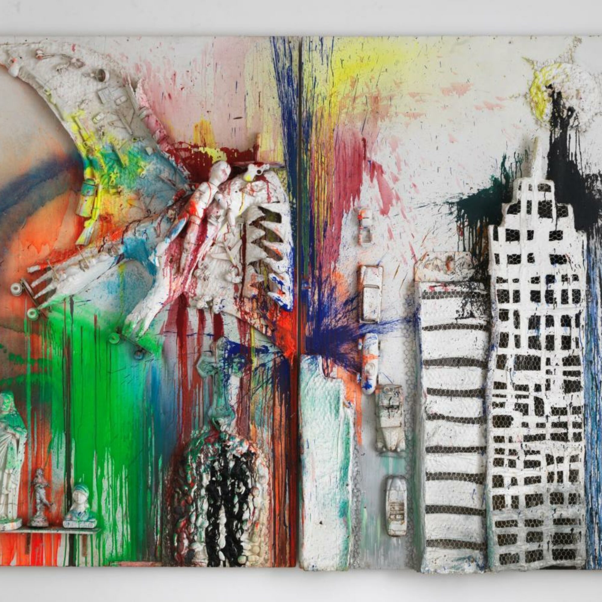 Splattered, saturated paint drips over a mock up of New York's cityscape by Niki de Saint Phalle