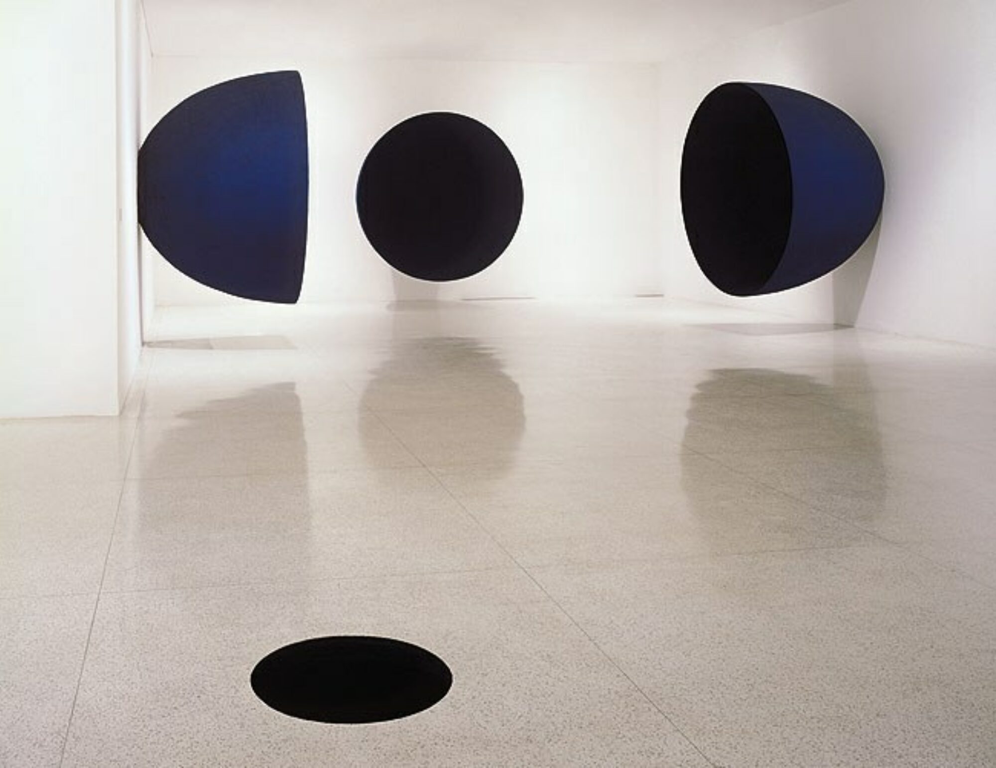 Anish Kapor sculptures of blue orbs installed inside MCASD