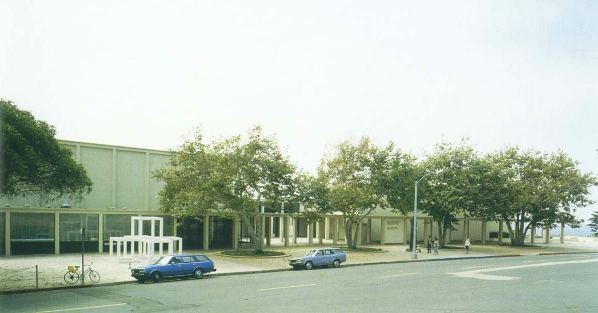 Front of MCASD La Jolla 1981, a couple of station wagons parked in front.