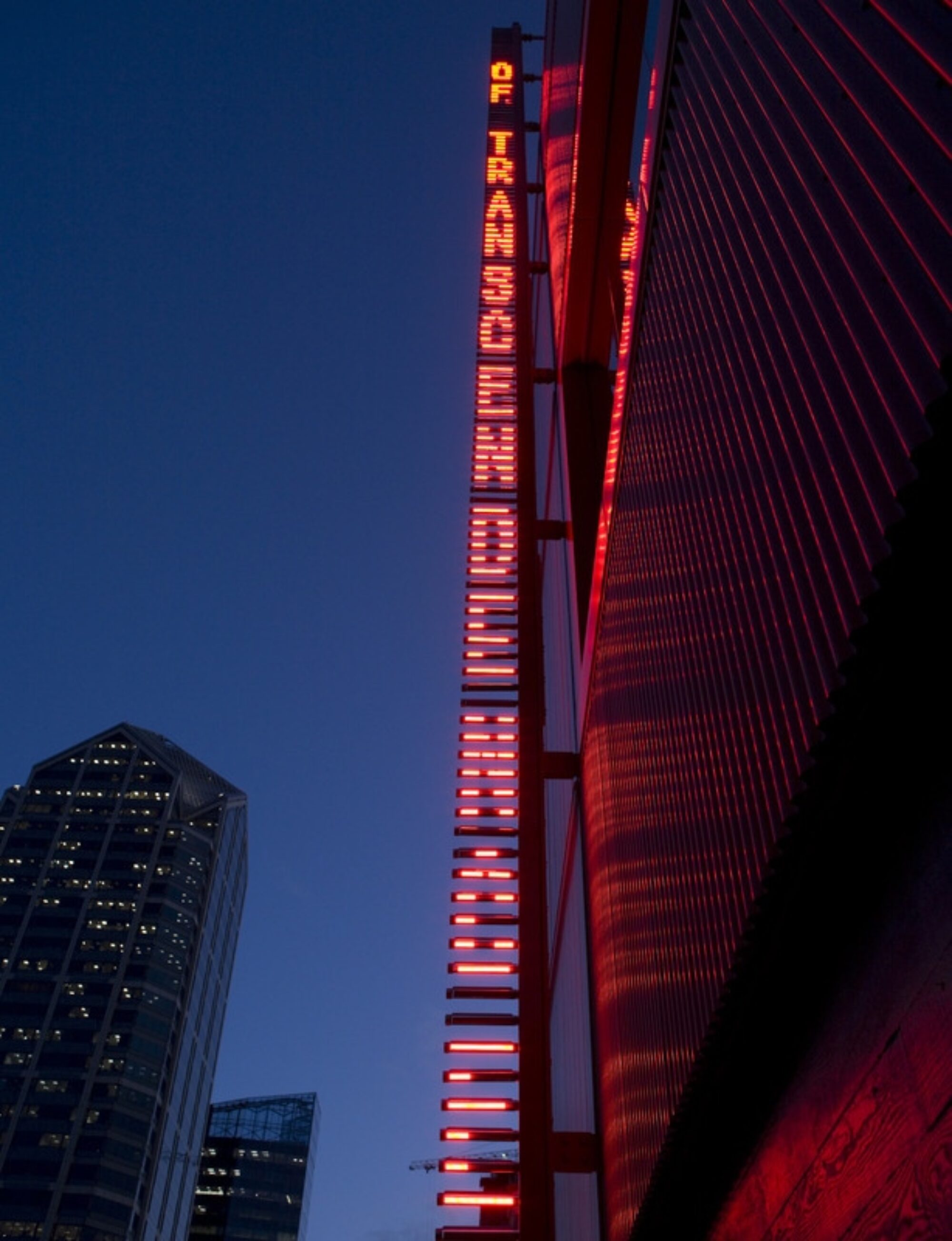 Jenny Holzer LED sign that reads Transcendence