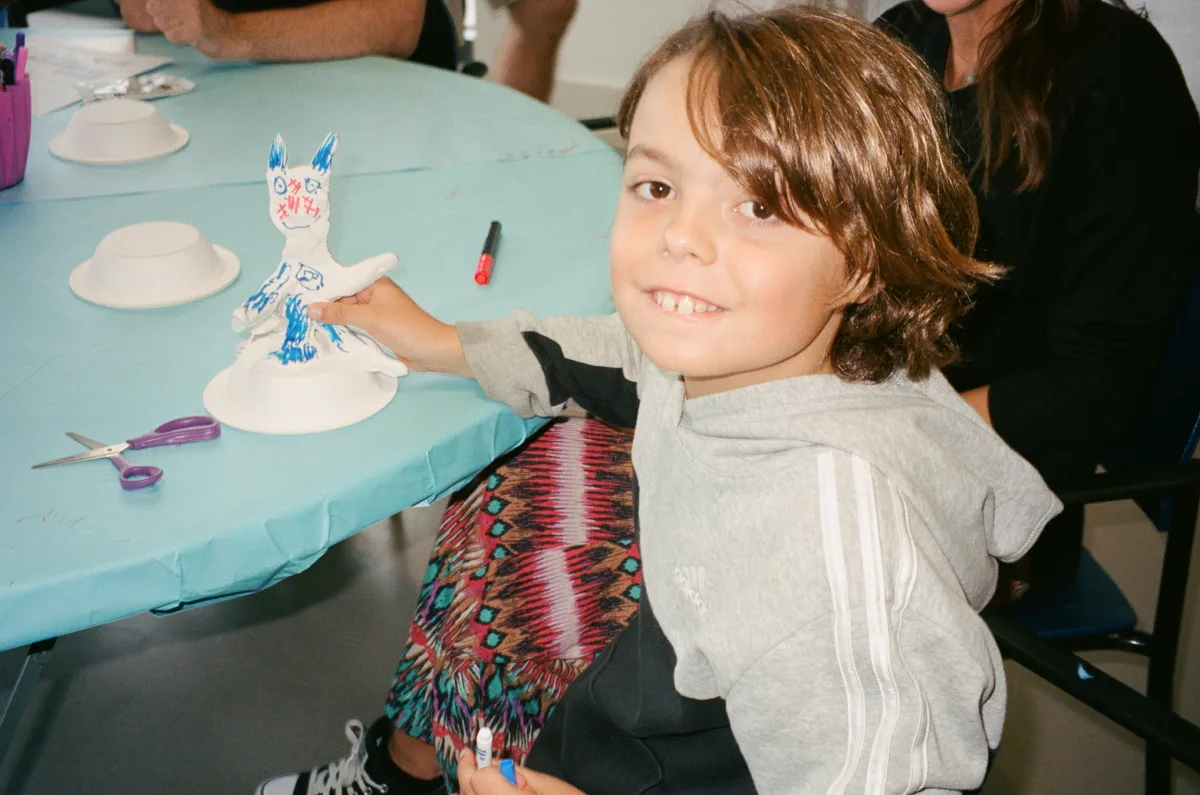 A child making art.