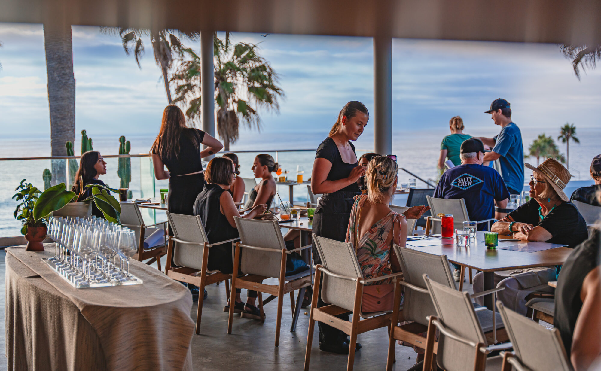 people dining in a seaside restaurant